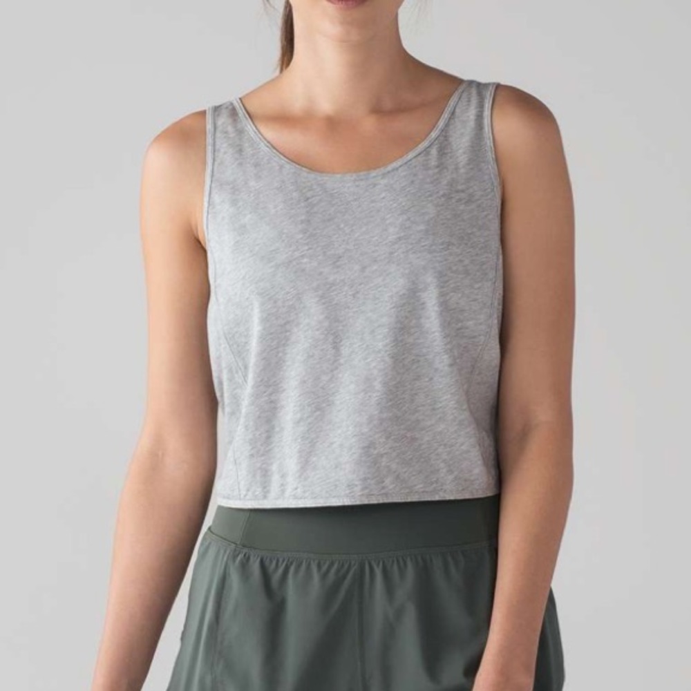 Lululemon it’s a tie tank in Heathered core Iight grey